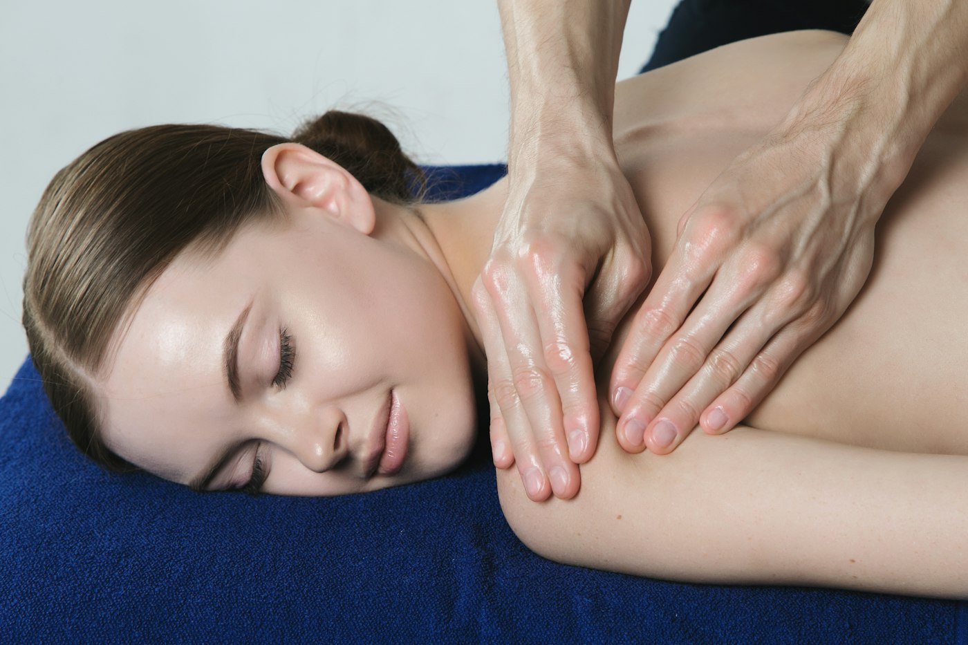 A relaxed client receiving a massage